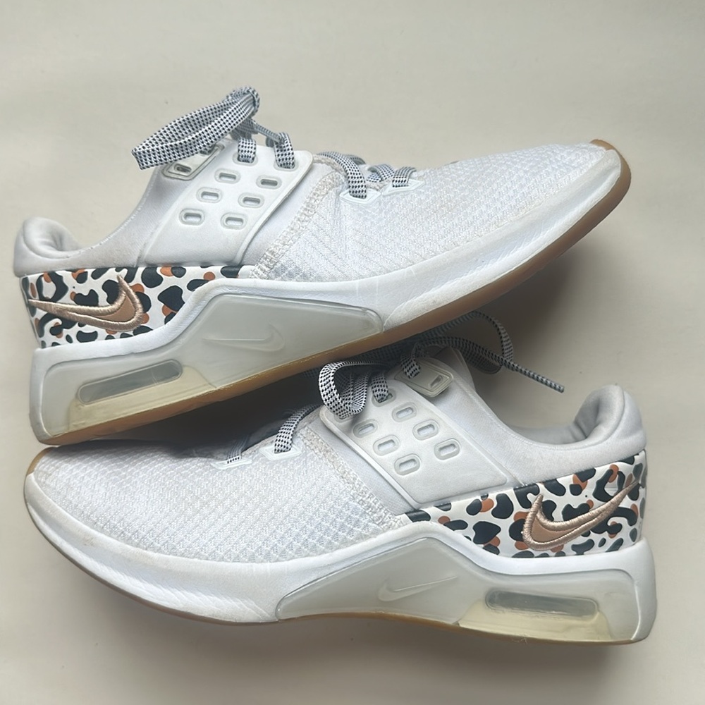 White Nike air max shoes, size 5 with gold Nike embroidering/cheetah print heal